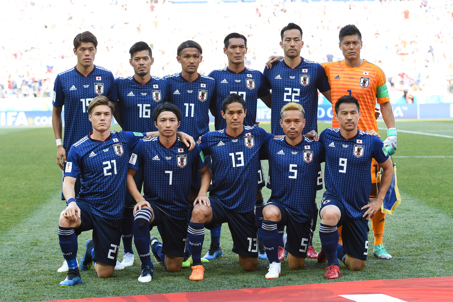 Japan national football team players line up before a match at the 2018 FIFA World Cup