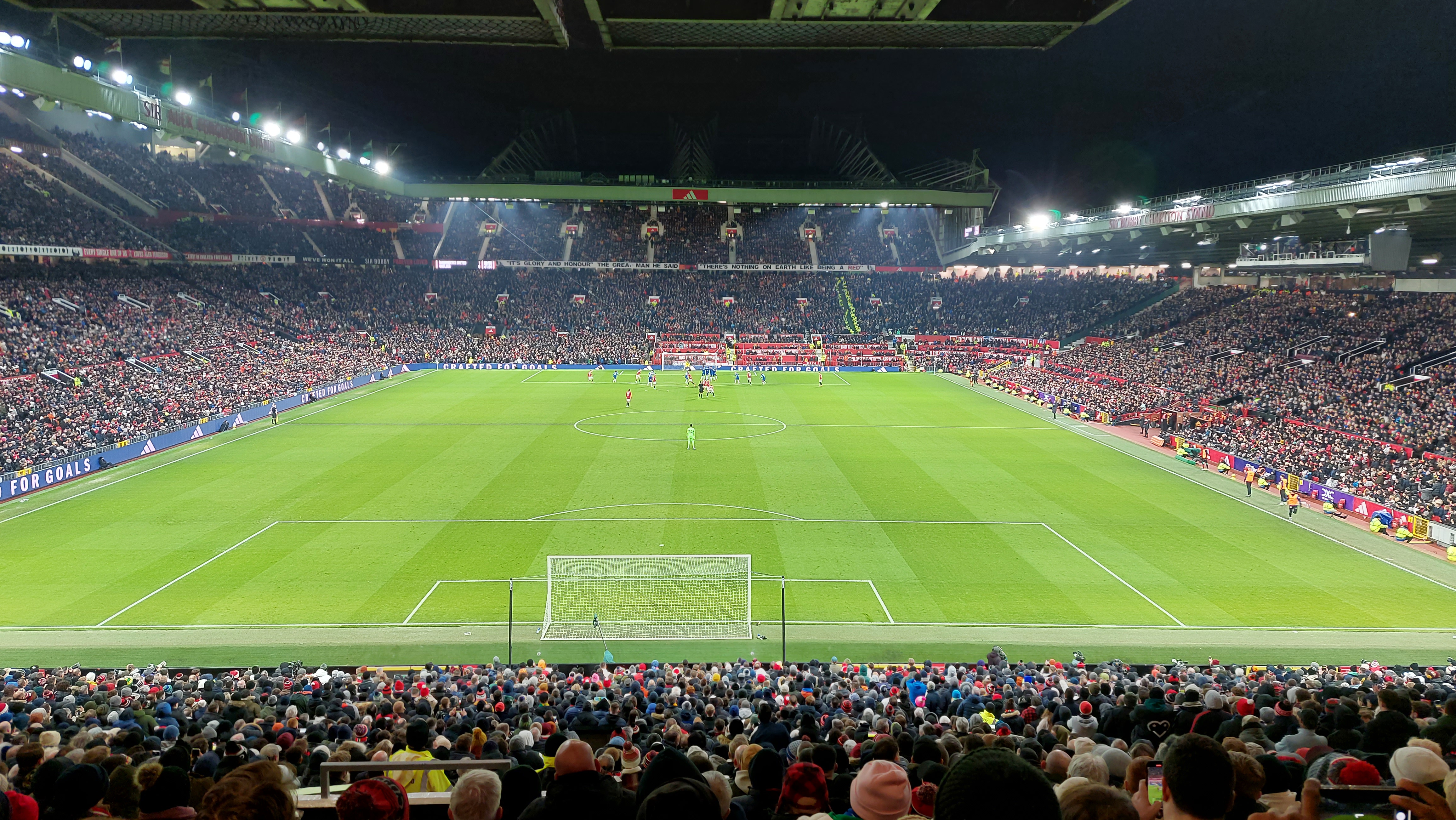 Old Trafford viewed from the Stretford End during an earlier Manchester United match; archival stadium photograph, not the Tottenham fixture.